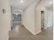 Hallway view showing entry into living room at 133 Hickory Course Circle, Ocala, FL 34472