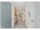 Entryway view with an arched hallway and decorative console table at 133 Hickory Course Circle, Ocala, FL 34472