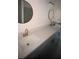 Bathroom vanity with dual sinks, modern fixtures, and a clean, contemporary design at 134 W Northside Dr, Lake Wales, FL 33853