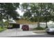 Spacious driveway leads to an attached garage, offering ample parking and convenience at 1420 Center St, Ocoee, FL 34761