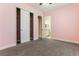 Bedroom featuring carpet flooring, closet and ensuite bathroom for convenience and privacy at 15424 Sweet Orange Ave, Winter Garden, FL 34787