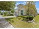 Charming single-Gathering home with a manicured lawn and paver driveway at 15424 Sweet Orange Ave, Winter Garden, FL 34787