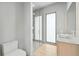 Contemporary bathroom with a glass-enclosed shower and modern fixtures at 1742 Temple Dr, Winter Park, FL 32789