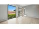 Bright bedroom with large windows, wooden floors, and modern minimalist design at 1742 Temple Dr, Winter Park, FL 32789