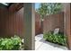 Unique metal facade with rock and leafy greenery in a modern, bright entryway at 1742 Temple Dr, Winter Park, FL 32789