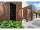 Eye-catching facade with wood slat siding and large black framed windows with a modern driveway design at 1742 Temple Dr, Winter Park, FL 32789