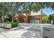 Stunning modern home with unique exterior, featuring a decorative driveway and mature landscaping at 1742 Temple Dr, Winter Park, FL 32789