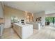 Expansive kitchen and dining area with modern appliances, sleek cabinetry, and a bright, open layout at 1742 Temple Dr, Winter Park, FL 32789