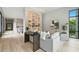 Open-concept living room, seamlessly connecting the kitchen and living spaces with modern decor at 1742 Temple Dr, Winter Park, FL 32789