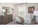 Cozy bedroom with natural light, modern furnishings, and stylish decor at 214 Oak Lane Rd, Ocala, FL 34472