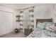 Charming bedroom with fun dinosaur decor and ample natural light at 214 Oak Lane Rd, Ocala, FL 34472