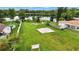 Expansive yard with basketball court, lake access, shed and plenty of space for outdoor activities and entertainment at 2154 Lake Christie Dr, Orlando, FL 32809