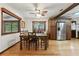 Charming dining area with hardwood floors, tin ceilings, and natural light at 2154 Lake Christie Dr, Orlando, FL 32809