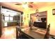 Inviting dining room featuring wood floors and a clear view into the kitchen at 2154 Lake Christie Dr, Orlando, FL 32809