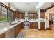Bright kitchen features stainless appliances, marble countertops, and stylish backsplash at 2154 Lake Christie Dr, Orlando, FL 32809