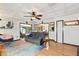 The living room features hardwood floors, modern lighting, and comfortable seating at 2154 Lake Christie Dr, Orlando, FL 32809