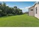 A large backyard offers a serene, green space for outdoor activities and relaxation at 2315 Black Lake Blvd, Winter Garden, FL 34787