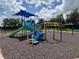 Colorful playground with slide and climbing equipment creates a fun and safe play area at 2315 Black Lake Blvd, Winter Garden, FL 34787