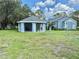 Community gazebo offers outdoor gathering space, perfect for picnics and socializing on the lawn at 2592 Grassy Point Dr # 106, Lake Mary, FL 32746