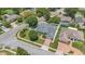 Aerial view of home showcasing the front lawn, landscaping and driveway at 2674 Sugar Pine Run, Oviedo, FL 32765