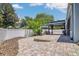 Spacious backyard patio featuring brick pavers, gazebo, and a lovely landscape, perfect for outdoor entertaining at 2674 Sugar Pine Run, Oviedo, FL 32765