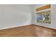 Cozy bedroom with wood floors and a window with natural light streaming in at 2674 Sugar Pine Run, Oviedo, FL 32765