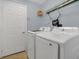 Laundry room with white washer and dryer at 2674 Sugar Pine Run, Oviedo, FL 32765
