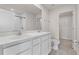 En suite bathroom featuring a double vanity with sinks, toilet, and walk-in closet at 275 Blueberry Ln, Davenport, FL 33837