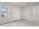 A bright bedroom features a window with natural light and an open closet at 275 Blueberry Ln, Davenport, FL 33837