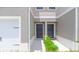 A closer look at the front entrances and a one-car garage at 275 Blueberry Ln, Davenport, FL 33837