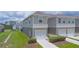 Inviting townhome offering an attached garage and beautiful green space at 275 Blueberry Ln, Davenport, FL 33837