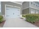 Single-car garage on a well-kept townhome at 275 Blueberry Ln, Davenport, FL 33837