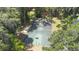 Aerial view of a community basketball court surrounded by mature trees at 2767 Aragon Ter, Lake Mary, FL 32746