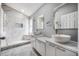 A bathroom featuring double vanities, a glass shower, and tile floors at 2767 Aragon Ter, Lake Mary, FL 32746