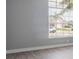 Bedroom with neutral wall paint, modern flooring, and a view of neighborhood from a window with blinds at 2767 Aragon Ter, Lake Mary, FL 32746