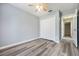 Comfortable bedroom with neutral walls, closet and wood-look floors at 2767 Aragon Ter, Lake Mary, FL 32746