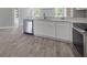 Bright kitchen featuring stainless steel appliances, white cabinetry and tile floors at 2767 Aragon Ter, Lake Mary, FL 32746