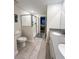 The full bathroom offers a walk-in shower and double sink vanity at 2855 Bookmark Dr, Kissimmee, FL 34746