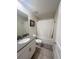 The bathroom features a shower-tub combo with a single sink vanity at 2855 Bookmark Dr, Kissimmee, FL 34746