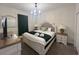 Well-lit bedroom with stylish chandelier, comfortable bed, and coordinated decor at 2855 Bookmark Dr, Kissimmee, FL 34746