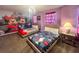 The playful bedroom has two twin beds and a delightful Mickey Mouse theme at 2855 Bookmark Dr, Kissimmee, FL 34746