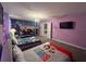The bedroom boasts twin beds and a bunk, adorned with Mickey Mouse decor at 2855 Bookmark Dr, Kissimmee, FL 34746