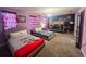 The bedroom boasts twin beds and a bunk, adorned with Mickey Mouse decor at 2855 Bookmark Dr, Kissimmee, FL 34746