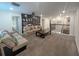 Spacious bonus room with a projector and movie themed wall art and comfortable seating at 2855 Bookmark Dr, Kissimmee, FL 34746
