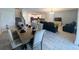 Open-concept living and dining area featuring modern tile flooring and abundant natural light at 2855 Bookmark Dr, Kissimmee, FL 34746