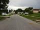 Residential street view showcasing the neighborhood's peaceful atmosphere at 3017 Lambath Road, Orlando, FL 32818