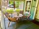 Inviting front porch featuring comfortable seating, perfect for relaxing outdoors at 311 W 10Th St, Sanford, FL 32771