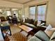 Cozy living room with comfortable seating and view into the adjacent dining area at 311 W 10Th St, Sanford, FL 32771