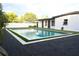 Backyard pool with putting green and a surrounding gravel at 319 Halsey St, Orlando, FL 32839