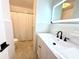 Updated bathroom with a tiled shower and modern vanity at 319 Halsey St, Orlando, FL 32839